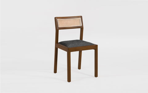 reddie-raw dining chair Rita Rattan Dining Chair