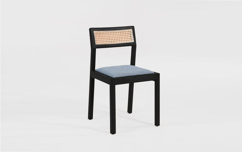 reddie-raw dining chair Rita Rattan Dining Chair