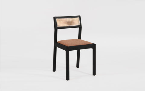reddie-raw dining chair Rita Rattan Dining Chair