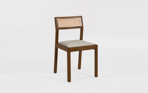 reddie-raw dining chair Rita Rattan Dining Chair