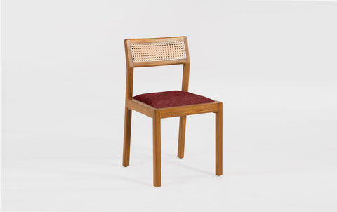 reddie-raw dining chair Rita Rattan Dining Chair